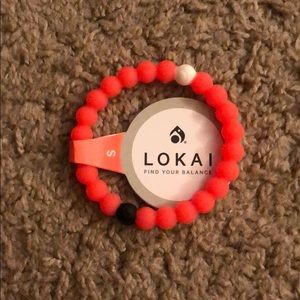Neon pink Lokai bracelet